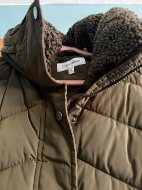 Brand new Calvin Klein Olive Green Puffer Jacket with Sherpa Lining